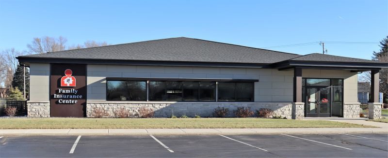 Freedom, WI - Exterior View of the Family Insurance Center Office Building in Freedom Wisconsin Against a Bright Blue Sky